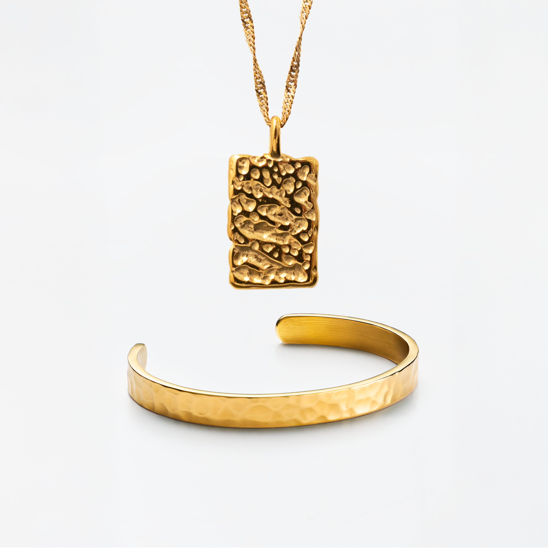 Gehamerd Verguld Set